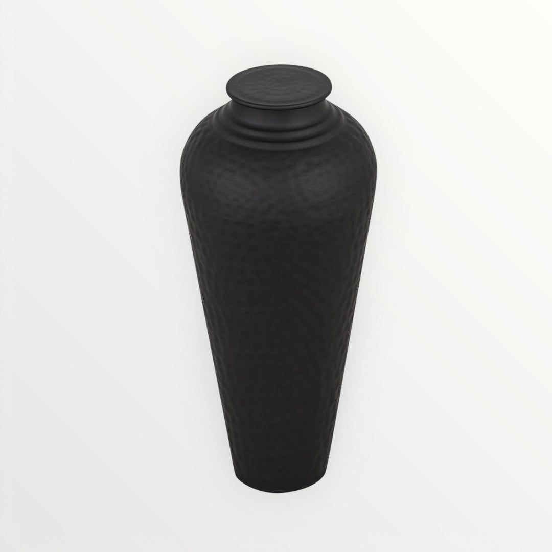 Matt black large hammered textured vase on a white background