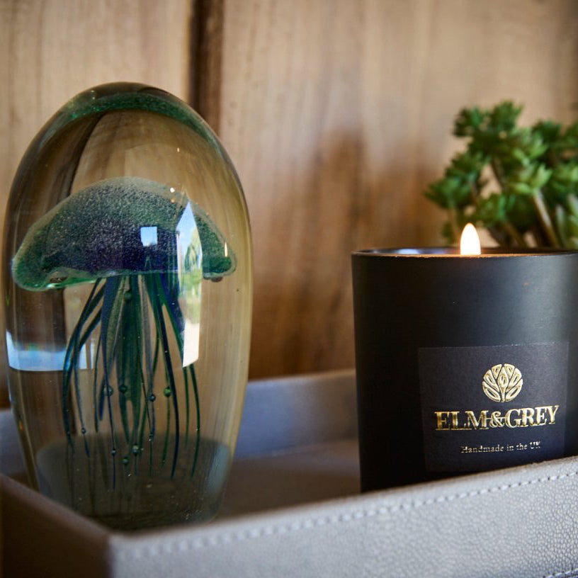 Blue and Green jellyfish on a tray with an elm and grey candle and succulent and faux shagreen tray