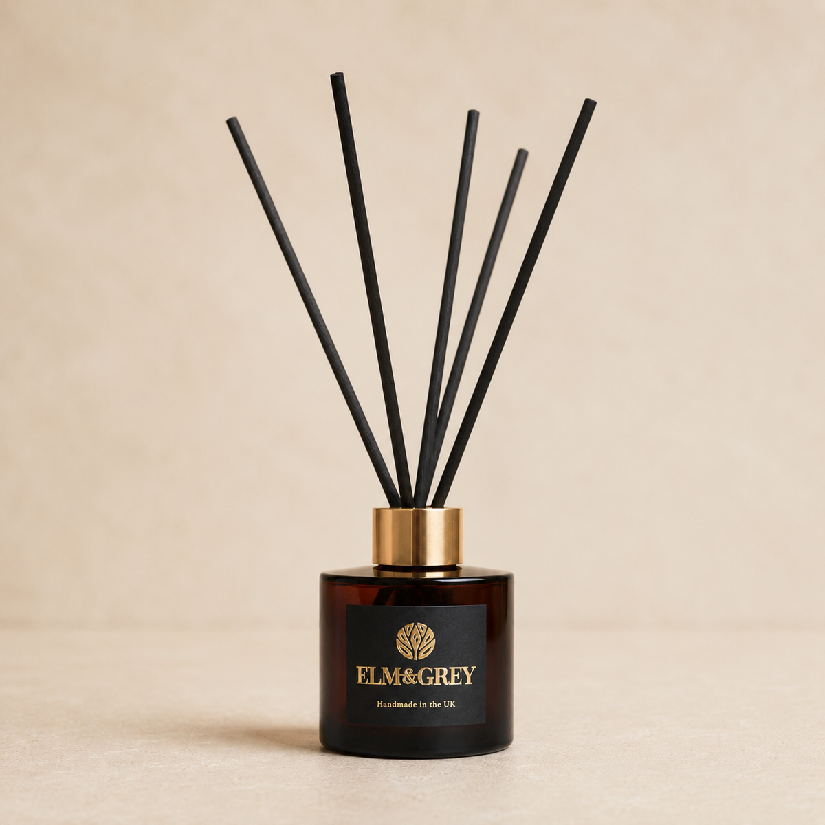 Elm & Grey Myrrh & Tonka Signature Reed Diffuser in amber glass with black reeds