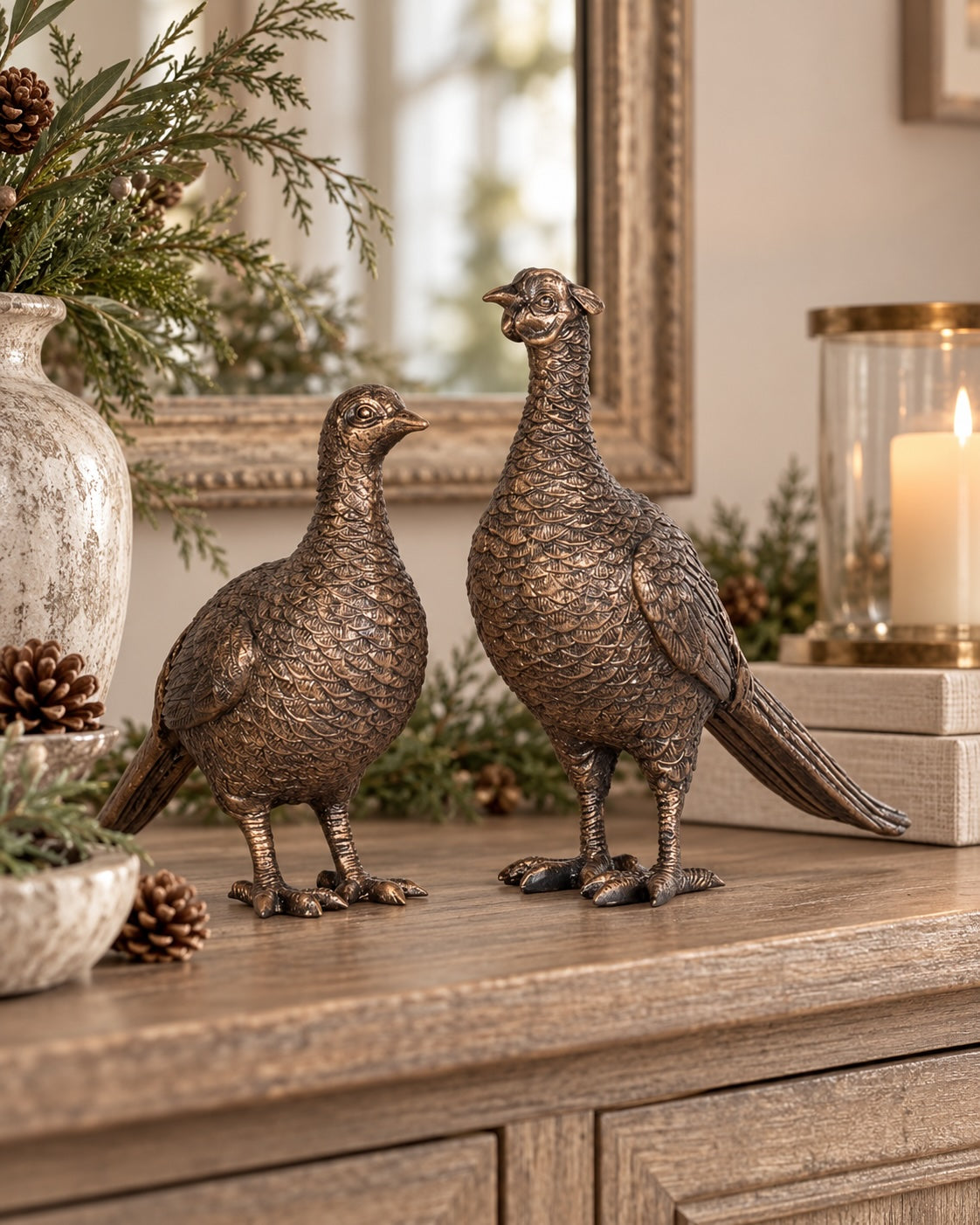Decorative pheasant ornaments styled on a country-inspired console