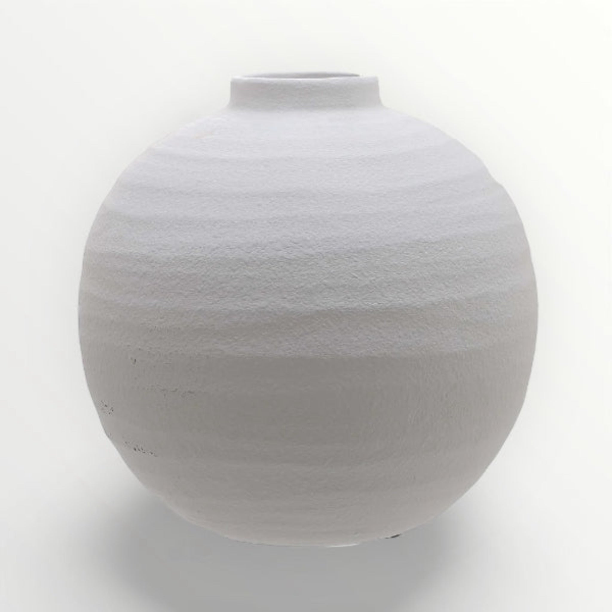 White textured vase on a white background