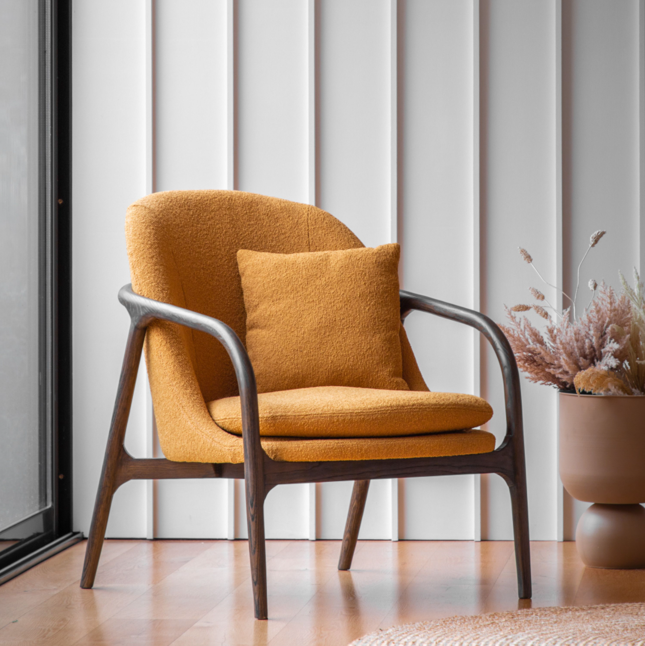 ochre coloured arm chair 