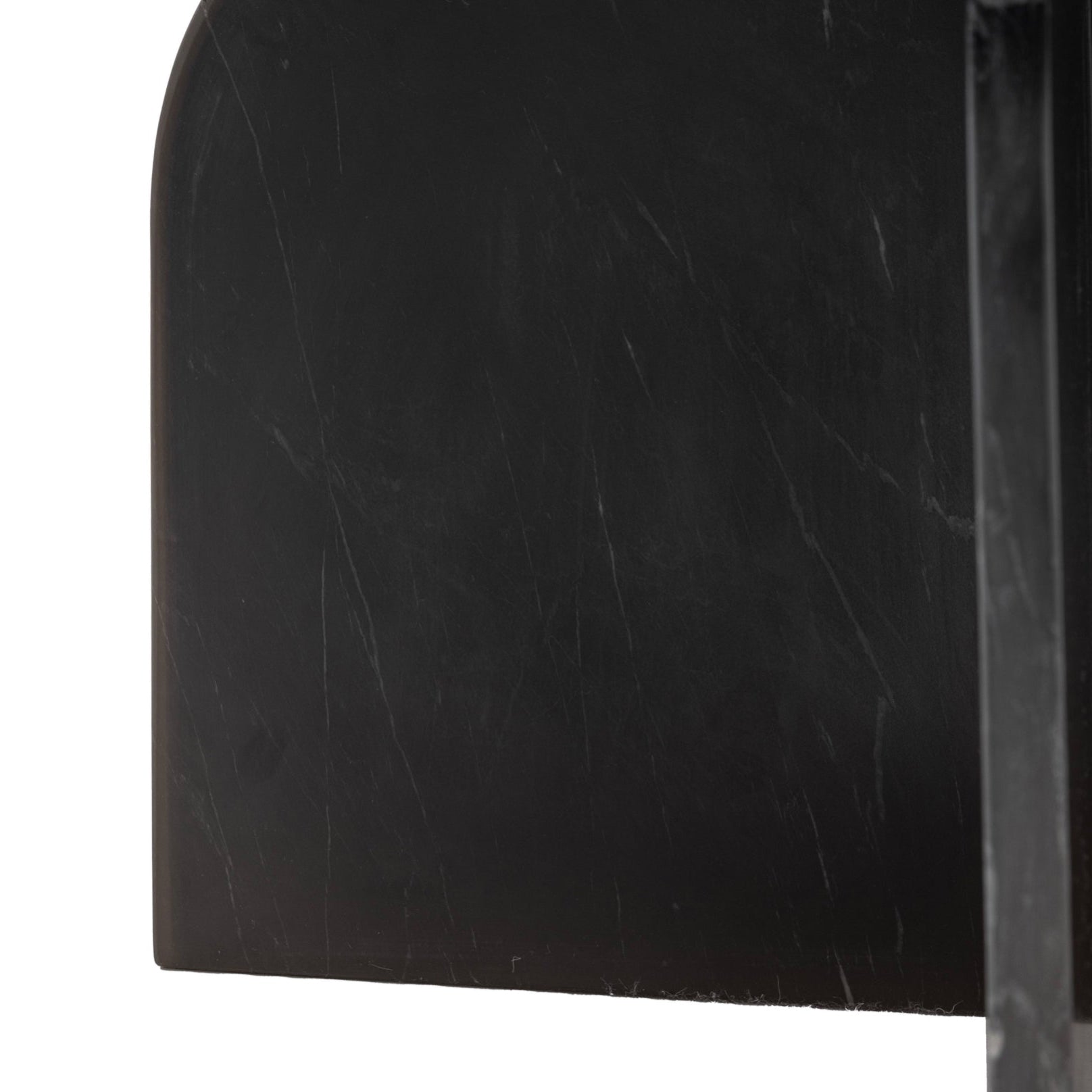 close up of black marble coffee table base