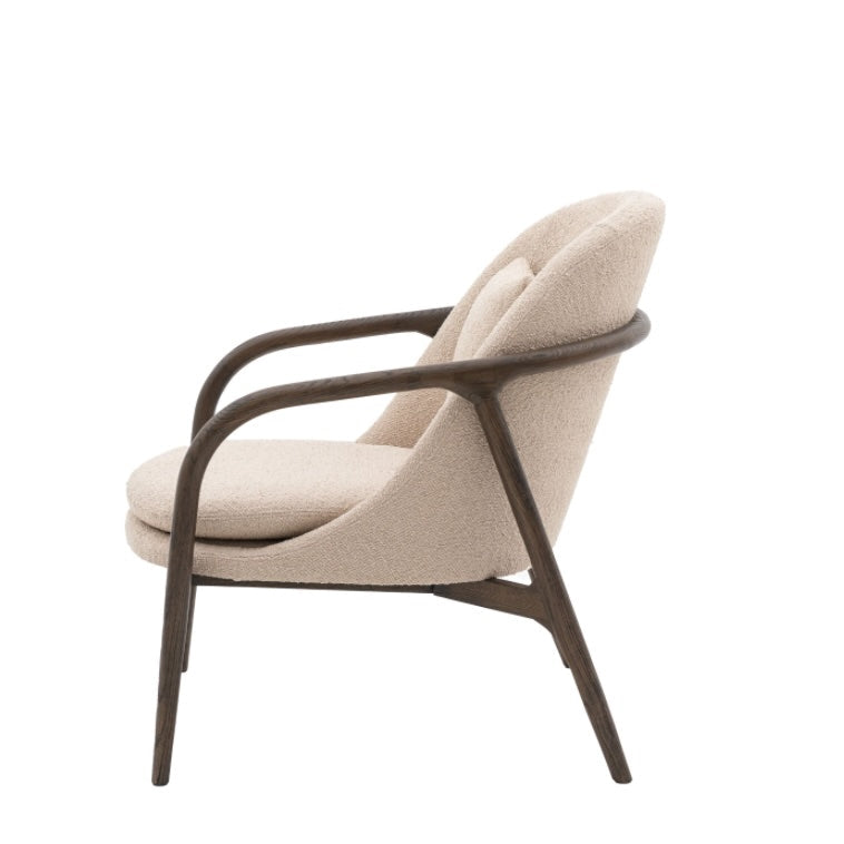 Taupe armchair with brown wooden frame on a white background, Elm & Grey.