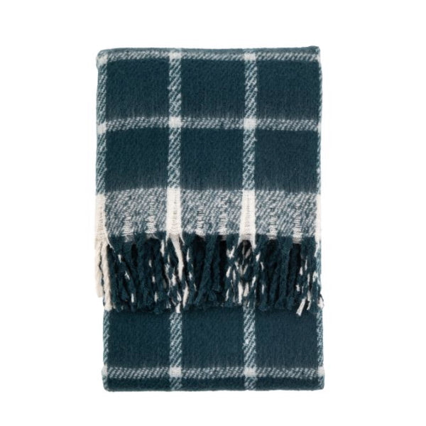 Plaid blanket with fringes on a white background