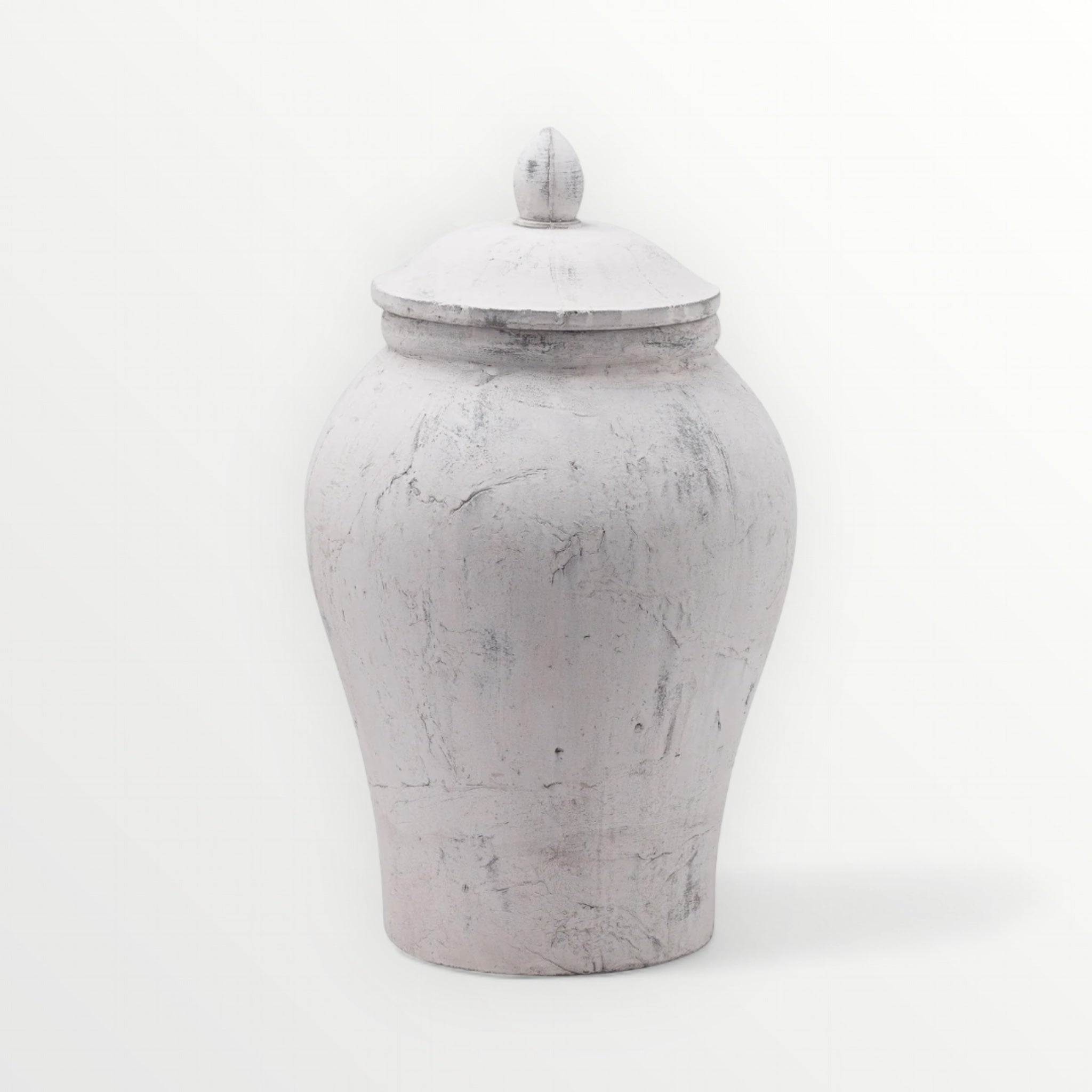 White ceramic jar with lid on a white background