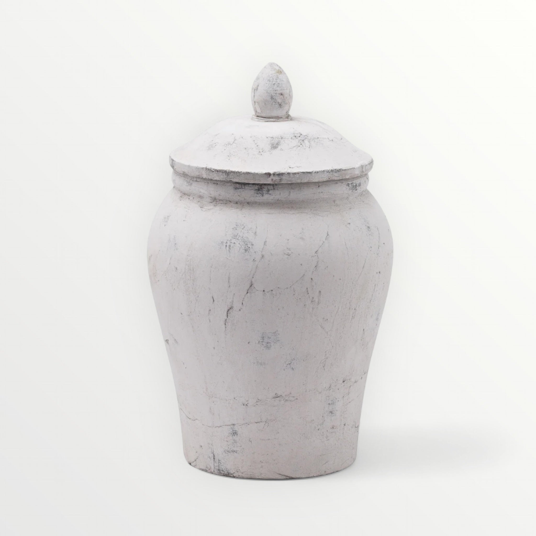 White marble-like jar with a lid on a white background