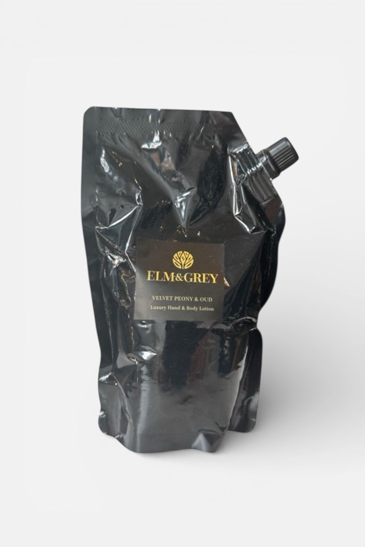 Black refill pouch velvet peony and oud packaging with Elm & Grey branding on a white background