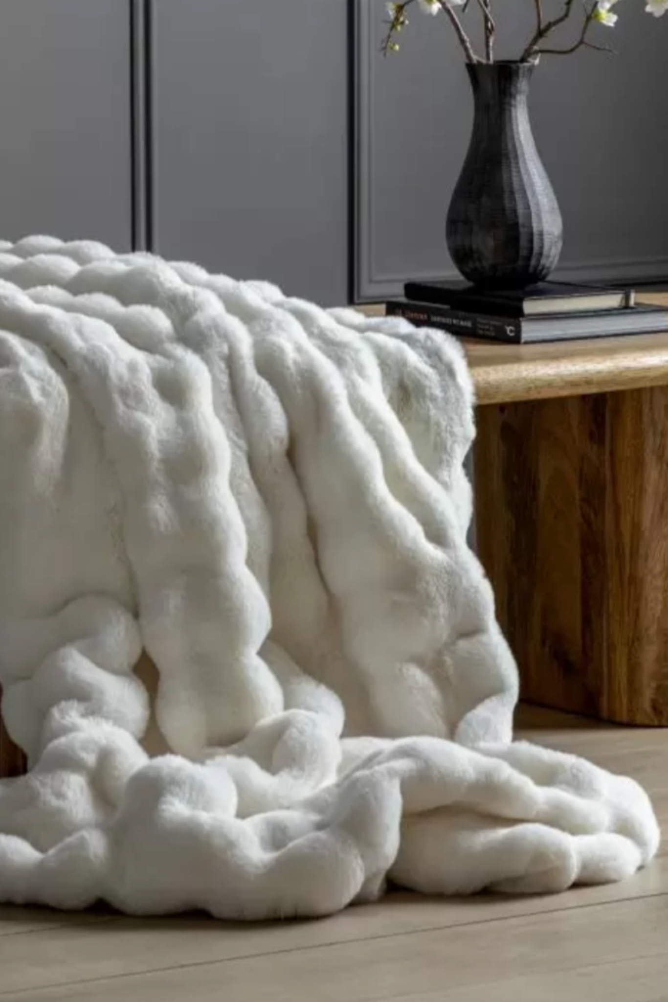 Marshmallow Cosy Throw on a bench in cream white