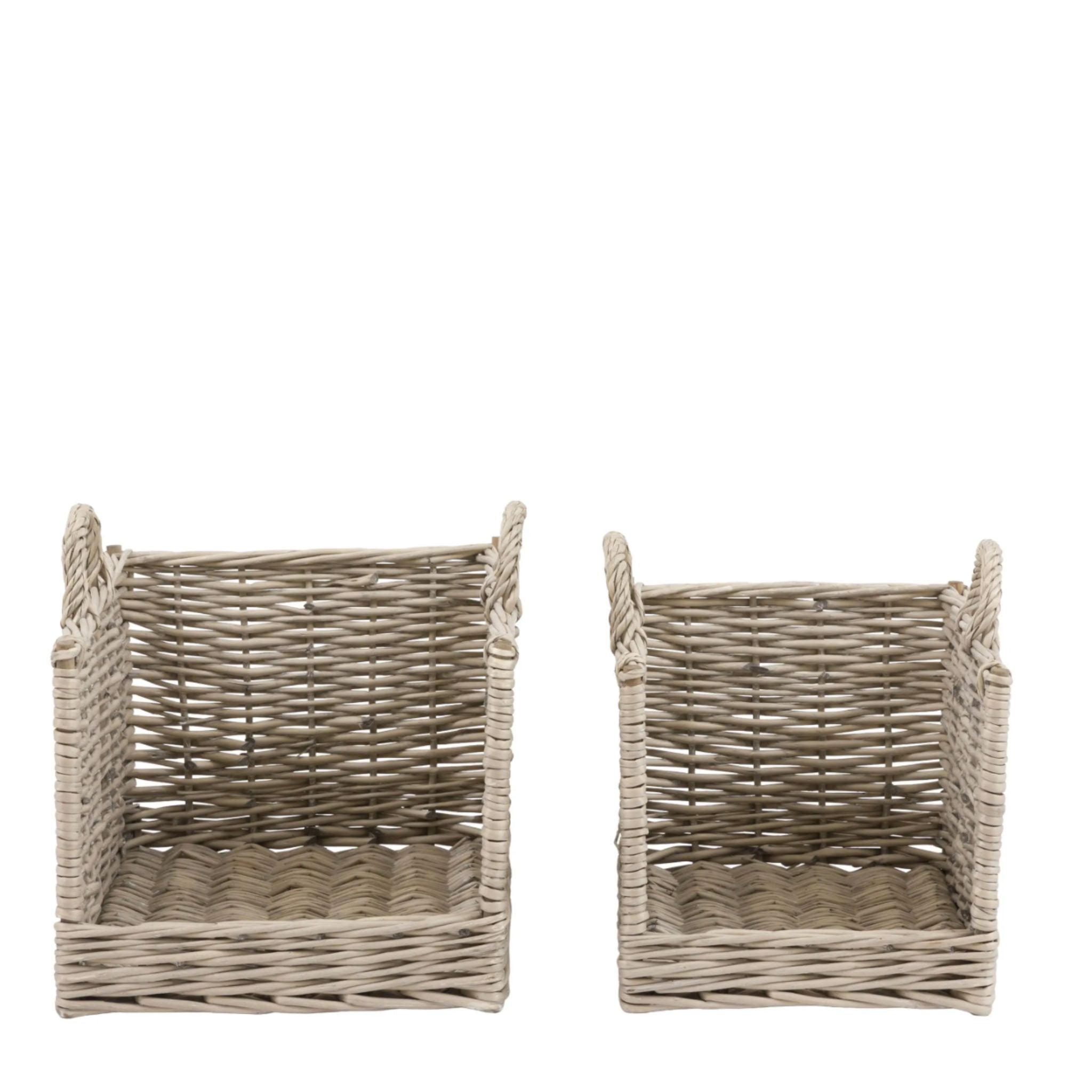 Two wicker baskets on a white background