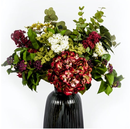 deep red faux hydrangeas and skimmia