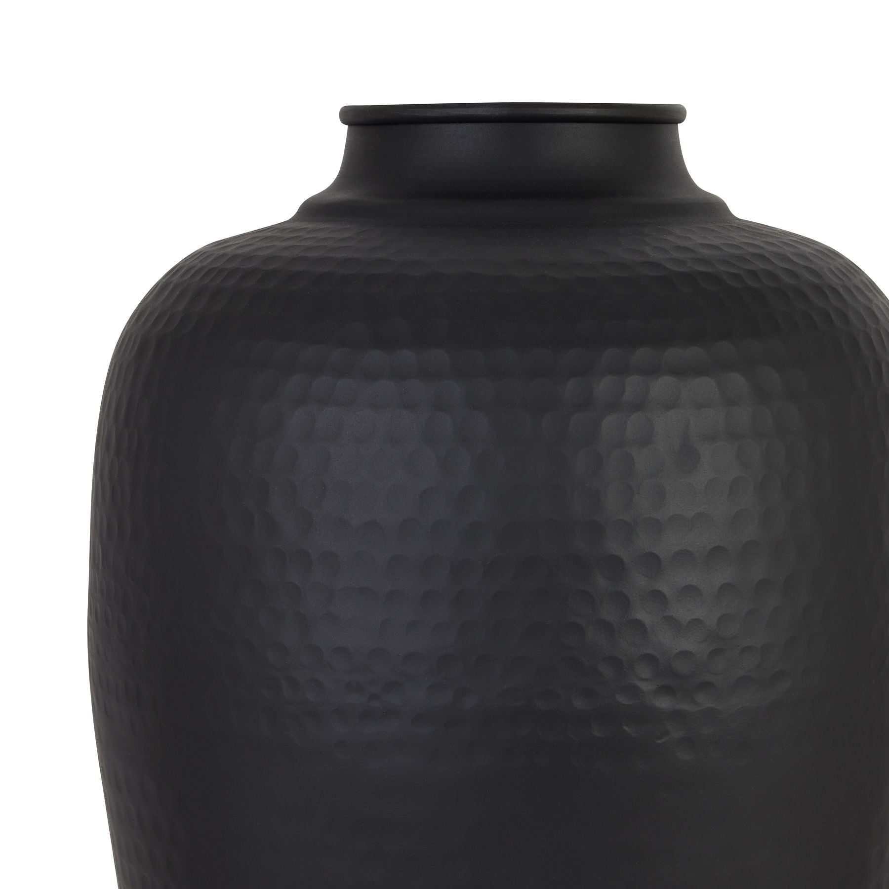 Close up of a matt black large hammered vase with a white background